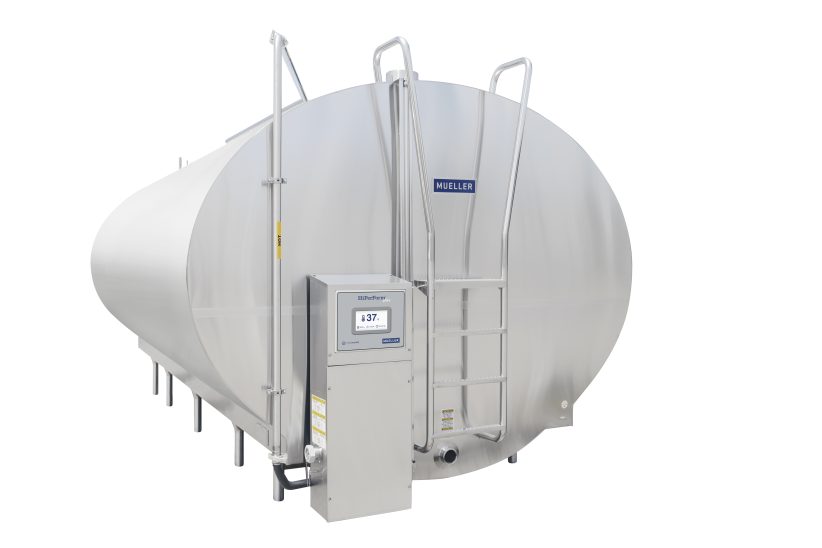 Mueller HiPerForm Plus 2018 Large stainless steam Mueller milk tank with access ladder and control panel.